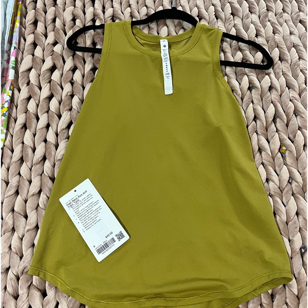 High neck lululemon tank size 4 . Worn once. Auric Gold